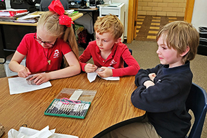 Students investigate rocks as part of a gemology unit.