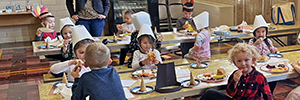 Preschool students enjoying a Thanksgiving Feast.