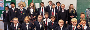 Middle School students pose in their Field Trip uniforms, worn even for a guest speaker.